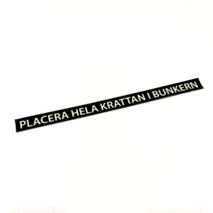 Dekal till kratta "Placera hela krattan i bunkern"